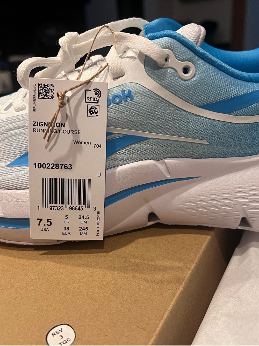 Reebok Women's Light Blue and White ZIGNITION Running Shoes